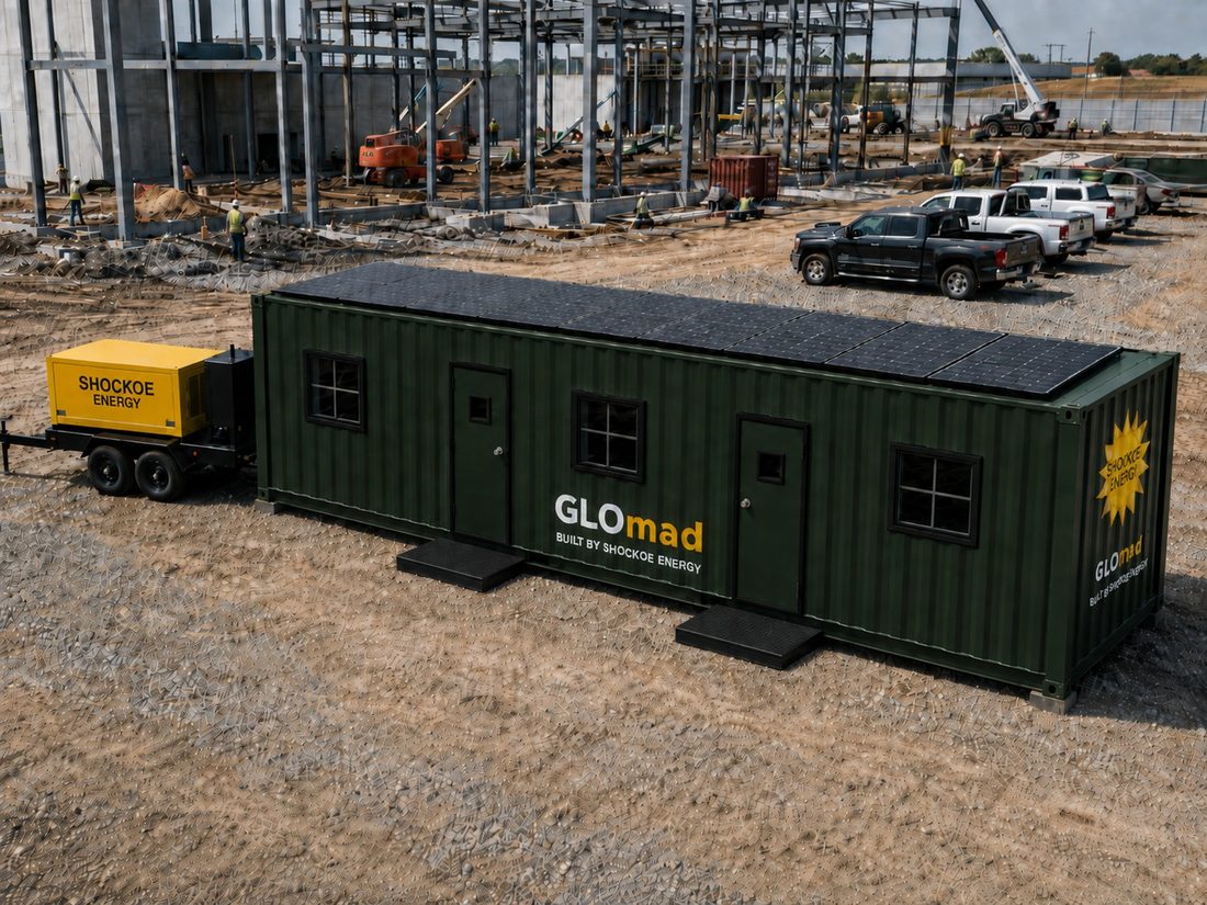 GLOmad office container with rooftop solar alongside its HyGen power unit